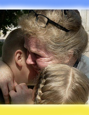 Liudmyla hugs her youngest children goodbye — BBC News.