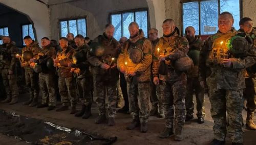 Ukraine war: The frontline city (Kupiansk) Russia could seize again. Russian forces are around 8km in the distance, but are pushing hard. Ukrainian troops hold a Christmas prayer near Kupiansk (BBC News).